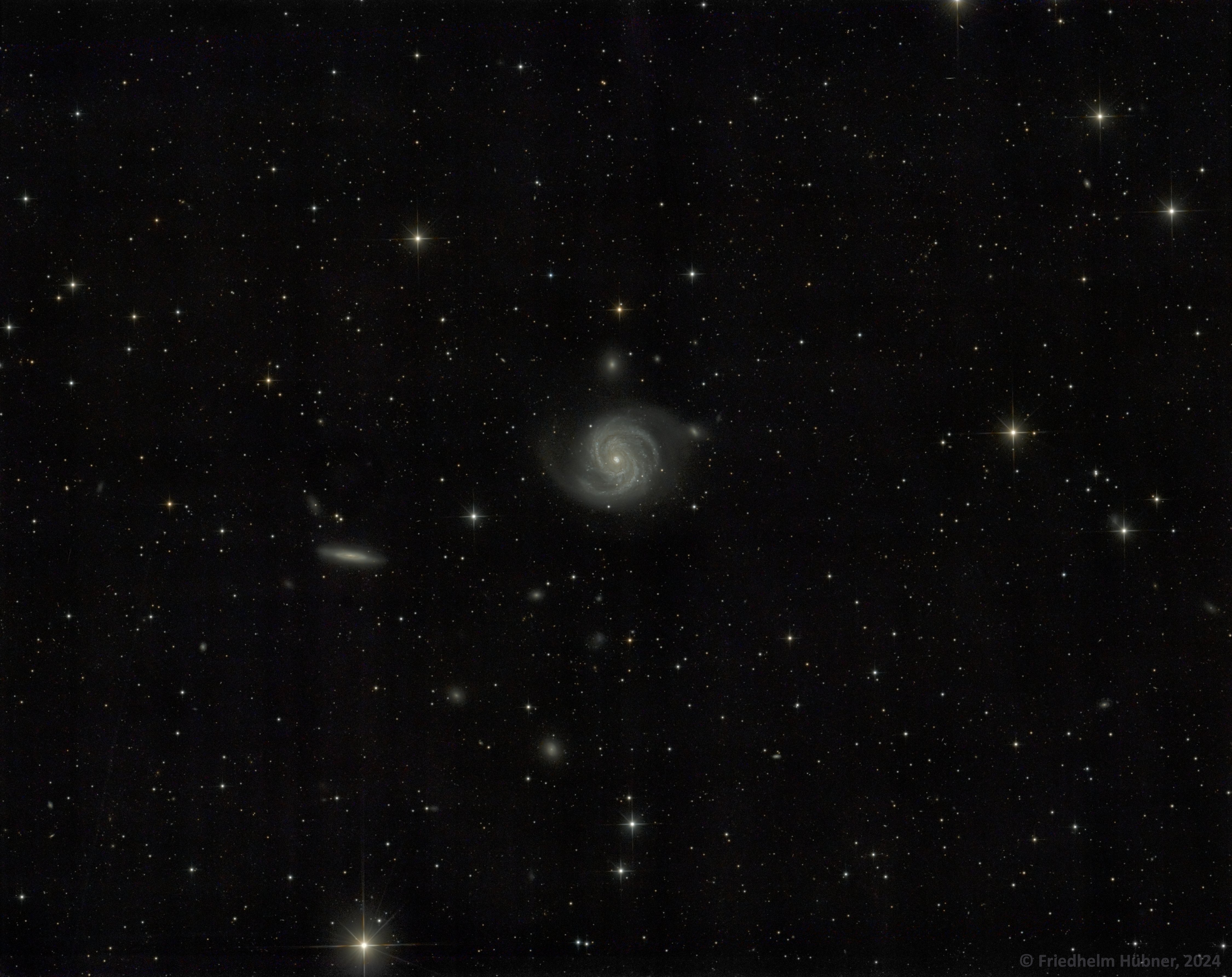 M100 (Com)